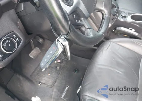 2016 Ford Escape Titanium z USA, uszkodzony, nr VIN 1FMCU0J99GUB82276